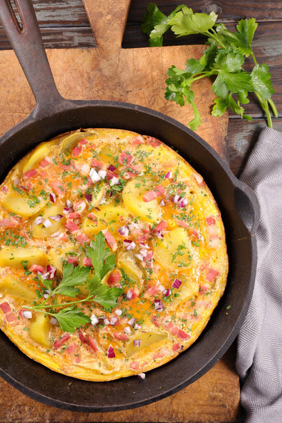 tortilla- omelet with potato,  onion and bacon - Fotografie, Obrázek