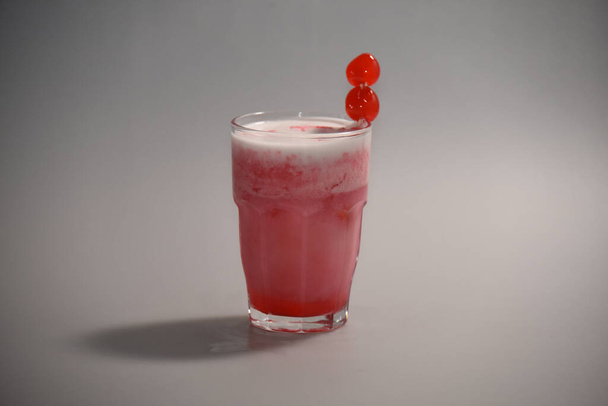 strawberry juice in glass on a white background - Valokuva, kuva