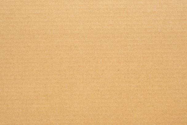 Barna öko-újrahasznosított karton papír lap textúra háttér - Fotó, kép