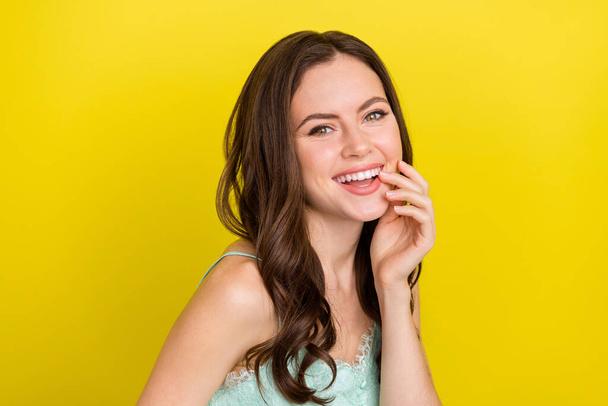 Portrait of overjoyed good mood pretty lady laughing hear good joke from friend isolated on yellow color background - Fotó, kép