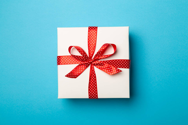 Gift box on color background. - Photo, Image