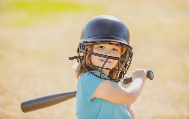 Little boy posing with a baseball bat. Portrait of kid playing baseball. - Foto, imagen