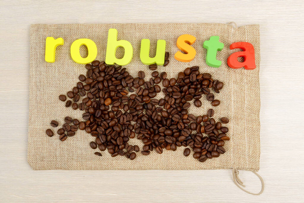 Robusta coffee beans, roasted grain flavour aroma cafe, natural coffee shop. - Photo, Image