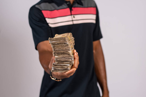 man with  money on a white background - Fotó, kép