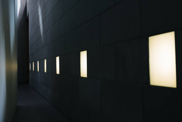 Dark room minimalism interior with light and a hallway - Zdjęcie, obraz