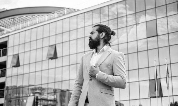 Fashionable brutal man wear formal business suit in street outdoor, modern life - Zdjęcie, obraz