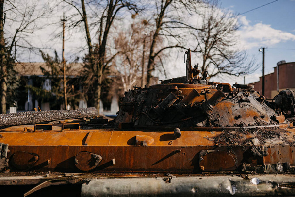 Borodyanka, Kyiv region, Ukraine. April 08, 2022: destruction and burnt out Russian military vehicle in Borodyanka - Photo, image