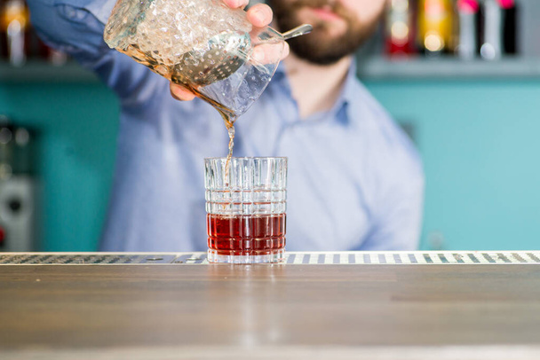 bartender prepares a great cocktail - 写真・画像