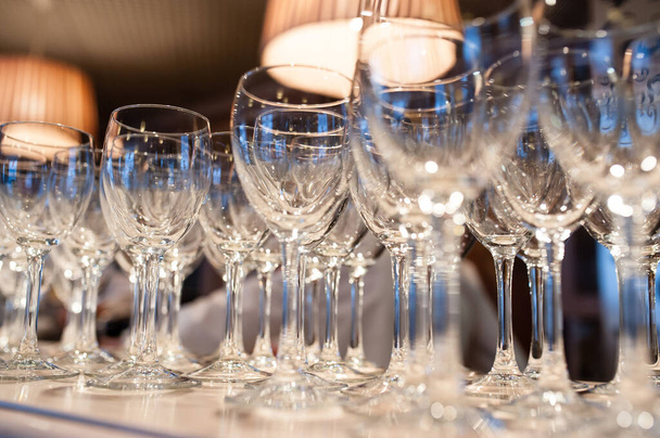 Composition of empty glasses for champagne at a festive event - Foto, Imagen