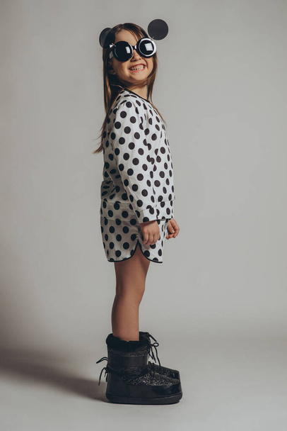 Beautiful and fashionable child girl. - Foto, imagen