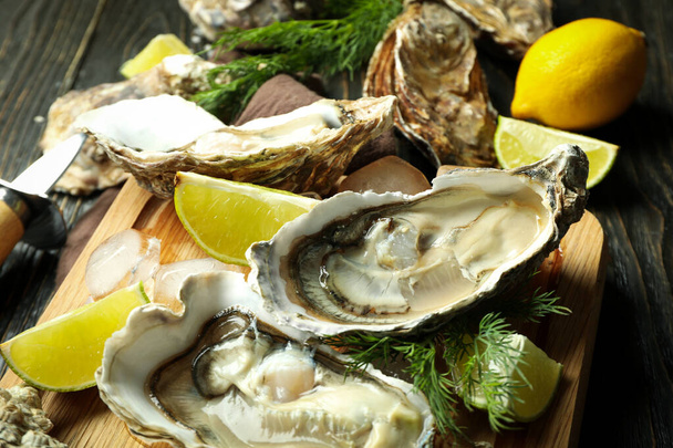 Concept of delicious seafood, oysters, close up - Foto, immagini