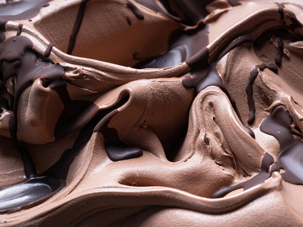 Chocolate flavour gelato - full frame detail. Close up of a brown surface texture of chocolate Ice cream covered with dark chocolate topping. - Fotoğraf, Görsel
