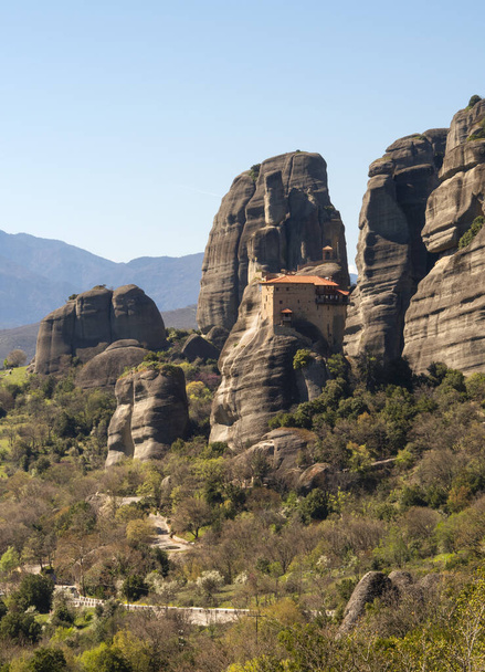 Panoramic view of the Meteora Mountains and Monastery of St. Nicholas of Anapavsas from the observation deck in Greece  - Фото, зображення