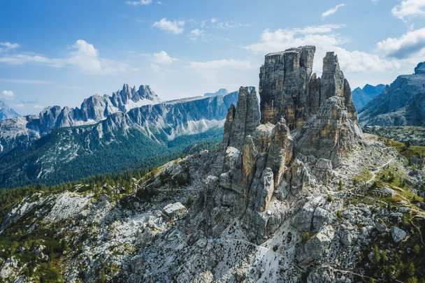 Aerial view of Cinque Torri in Dolomites mountains in Italy. Epic landscape on a sunny day of summer. - Zdjęcie, obraz