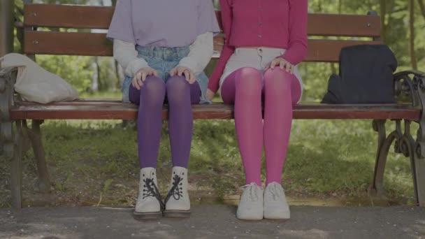 Teenagers dressed in bright tights. Video of details where only tights and girls hands are visible. - Footage, Video