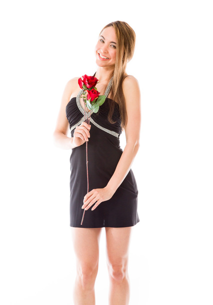 Modelo apaixonado por rosas vermelhas na mão
 - Foto, Imagem