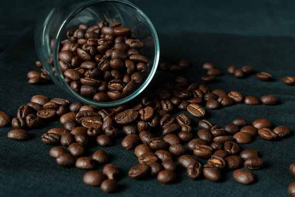 coffee beans on a dark background - Фото, изображение