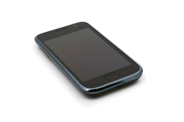 Dispositivo de teléfono con pantalla táctil, aislado sobre un fondo blanco
. - Foto, imagen