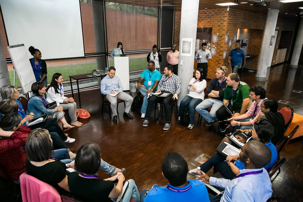 Johannesburg, South Africa - November 19, 2014: Diverse students attending a networking and leadership workshop - Foto, Imagem