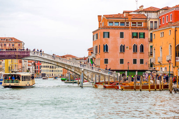 Venice, Italy - April 2, 2022: Beautiful canals and traditional Venetian buildings in Venice, Veneto, Northeast Italy. - Fotó, kép
