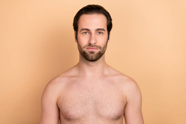 Photo of young man treatment therapy body care procedure clean smooth isolated over beige color background - Φωτογραφία, εικόνα