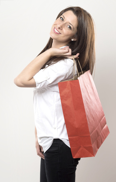 Girl with red shopping bag - Foto, Imagem