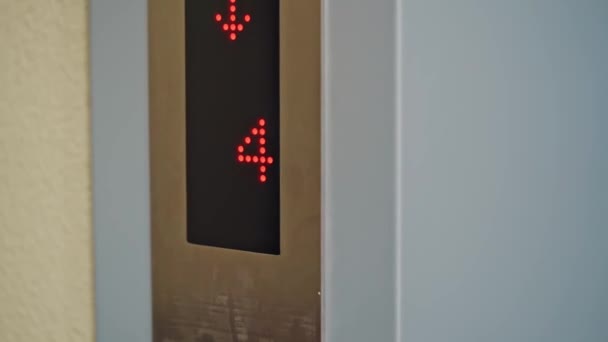 Close-Up of digital lift monitor showing floor number. - Materiał filmowy, wideo