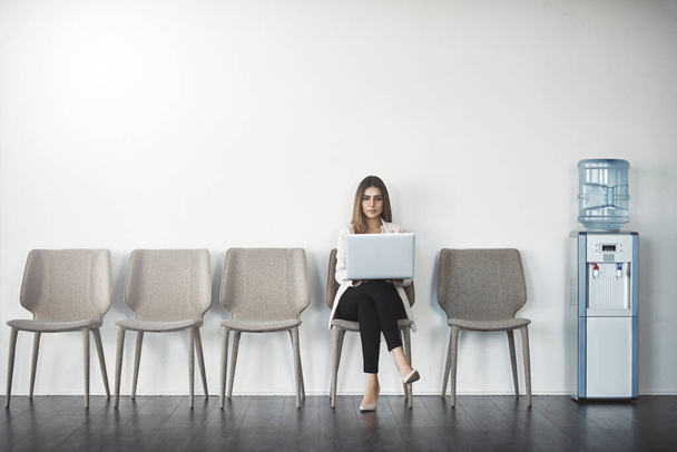 This job is mine. Studio shot of a businesswoman waiting in line against a white background. - 写真・画像