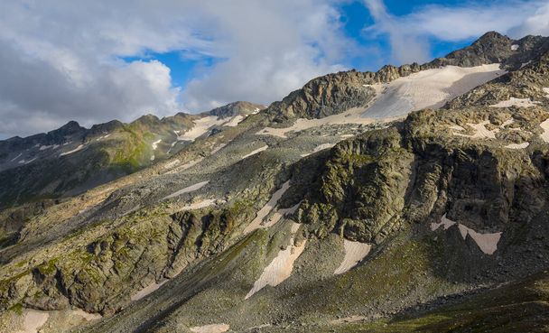 mountain ridge with glacier in dense clouds - Zdjęcie, obraz