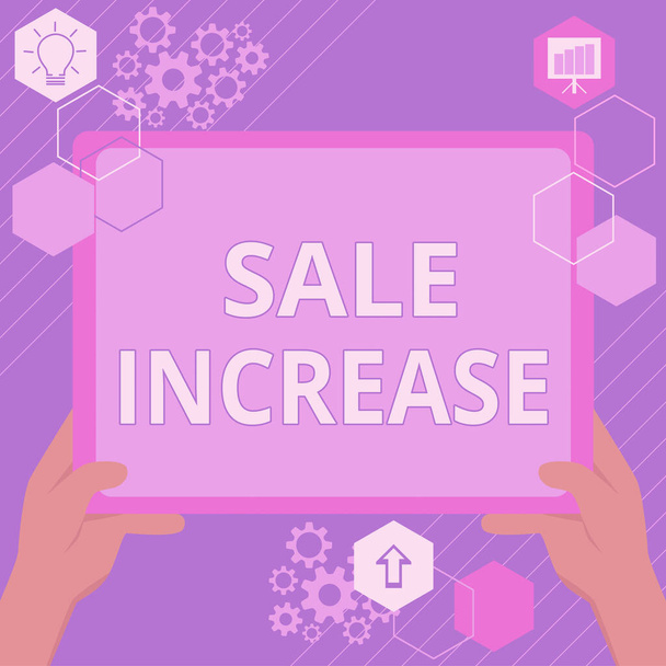 Writing displaying text Sale Increase. Conceptual photo Average Sales Volume has Grown Boost Income from Leads Hand Using Big Tablet Searching Plans For New Amazing Ideas - 写真・画像