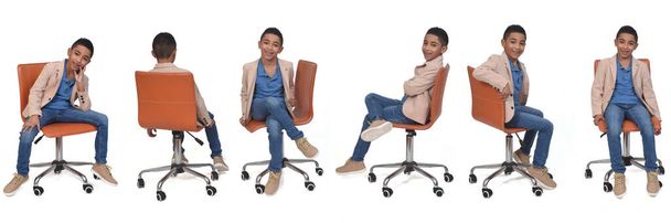 diverses poses de même garçon assis sur une chaise sur fond blanc - Photo, image