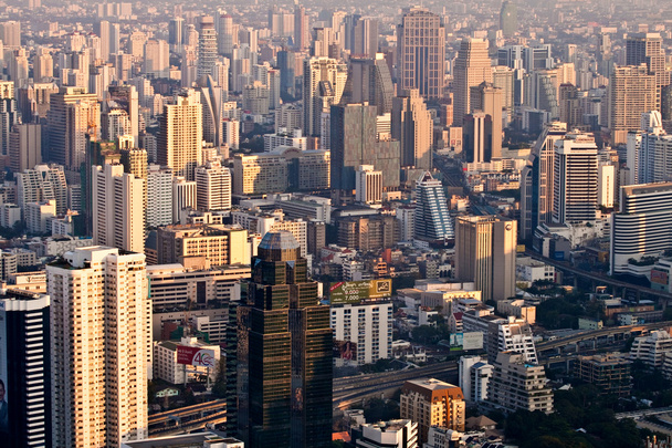 Aerial view over Bangkok in sunset - Photo, Image
