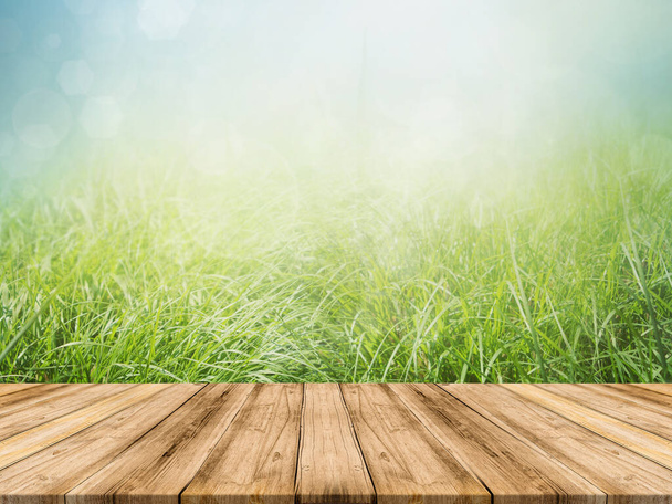 Wooden Table Top with Nature Background can be used mock up for montage products display or design key visual layout - Photo, Image