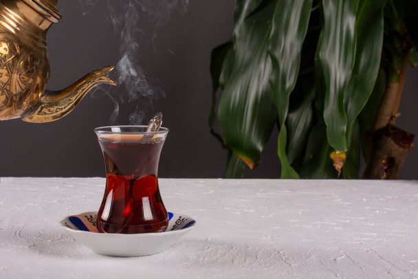 a glass of hot turkish tea on the table - Photo, Image