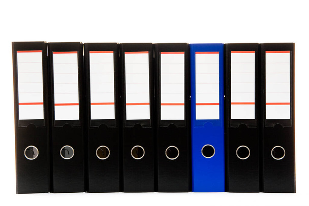 рядок папок для паперів і документації на полиці в офісі
 - Фото, зображення
