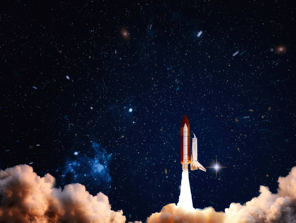 Spaceship takes off into the starry sky. Launch of Space . Elements of this image furnished by NASA - Photo, Image