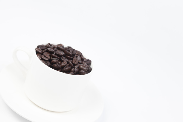 Coffee cup with coffee beans - Фото, изображение