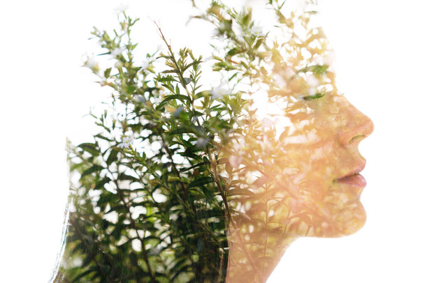 Double exposure portrait depicting emotions of a young woman - Photo, Image
