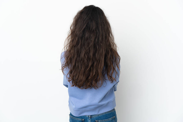 Adolescente ragazza russa isolata su sfondo bianco in posizione posteriore - Foto, immagini