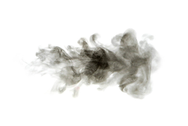 black dust powder explosion. The texture is abstract and splashes float. on a white background - Foto, Bild
