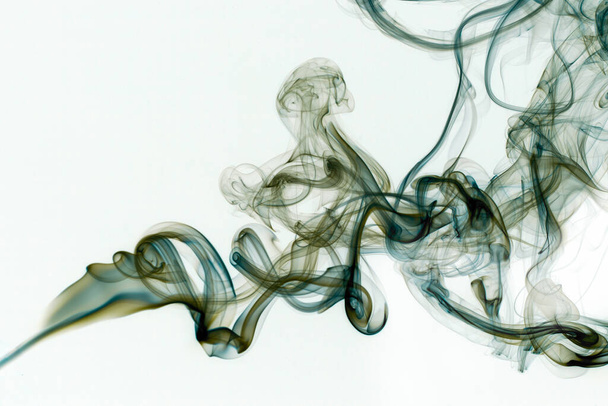 Movement of smoke, Abstract blue smoke on white background, blue background,blue ink background - Photo, Image