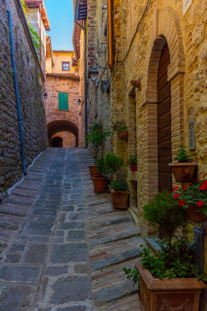 Narrow street in the old town of Gubbio in Italy. - Fotó, kép