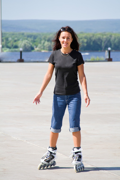 Young woman on roller skates - Fotografie, Obrázek