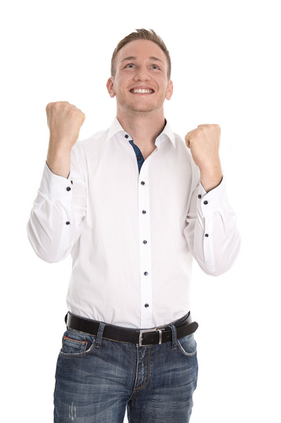 Successful cheering isolated young blond man making fist gesture - Foto, Imagem