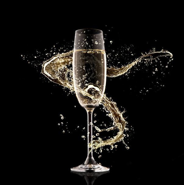 Champagne glass with splash - Foto, afbeelding