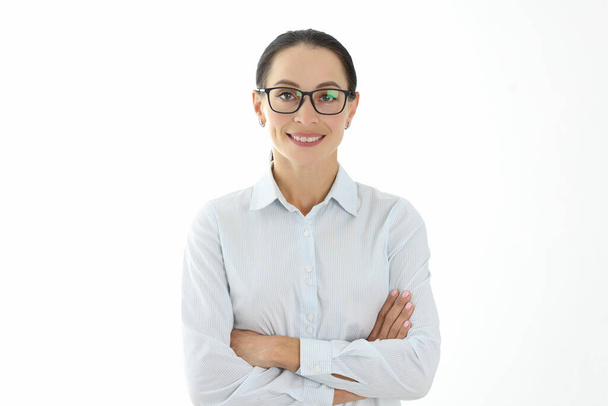 Portrait of businesswoman in glasses in shirt on white background - Фото, зображення
