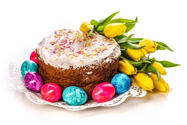 Orthodox Easter. Easter cake and colored eggs on a white background - Φωτογραφία, εικόνα