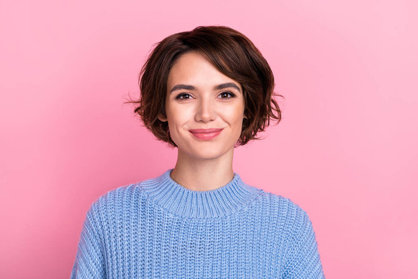 Portrait of adorable sweet positive young lady smiling wearing pastel blue comfy sweater isolated on pink color background - Foto, immagini