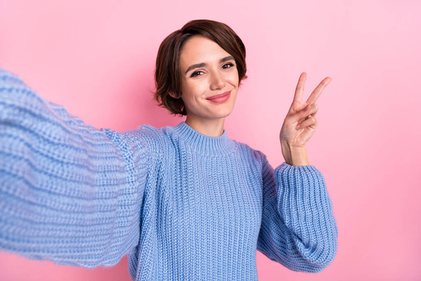 Portrait of cute adorable girl take selfie fingers make v-sign isolated on pastel pink color background - Φωτογραφία, εικόνα