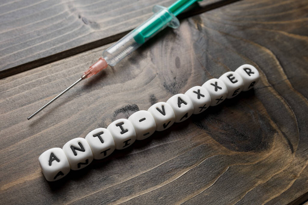 Corona virus Covid-19 vaccine text on wooden background  - Foto, immagini